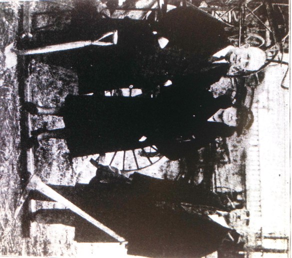     ARKANSAS DEMOCRAT photo of Mayor Overman, Mrs. Robinson and Mr. Allaire at the groundbreaking. The Broadway Bridge balustrades are visible in the background.
